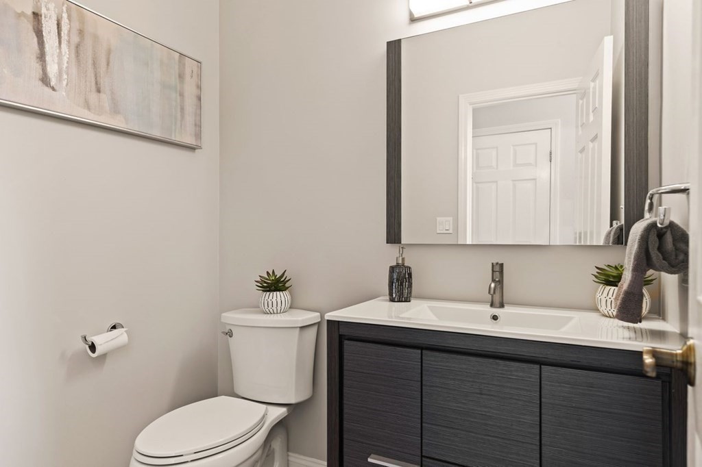 7 Wadsworth Way Sharon, MA 02067 - Photo 24 of 42 a bathroom with a sink vanity mirror and toilet