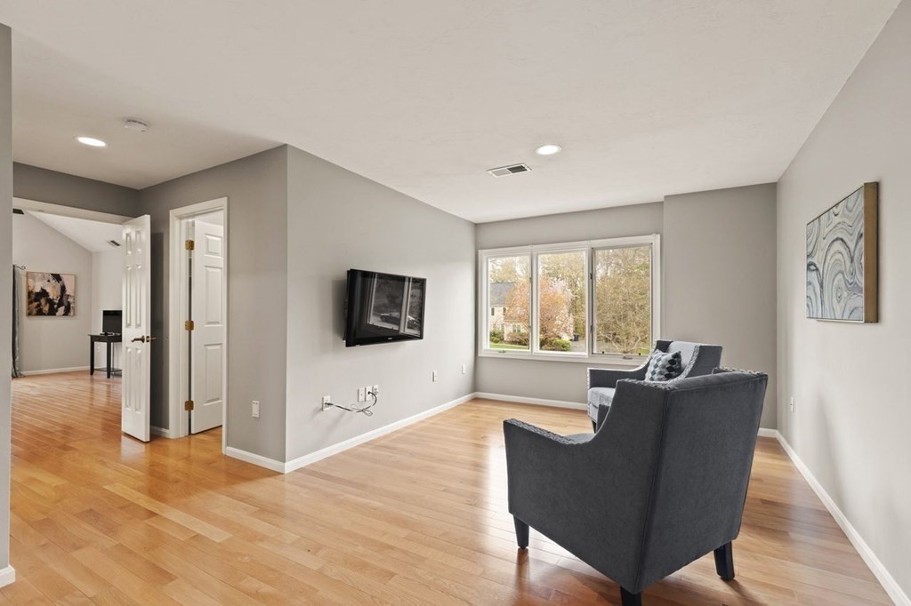 7 Wadsworth Way Sharon, MA 02067 - Photo 28 of 42 a living room with furniture window and flat screen tv