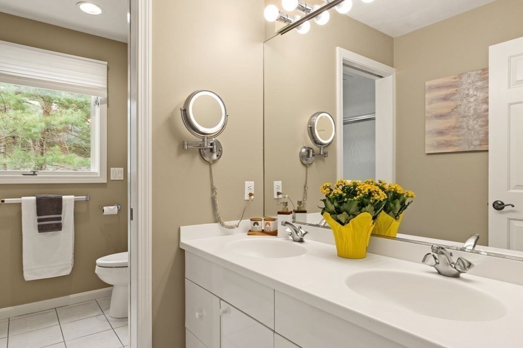 7 Wadsworth Way Sharon, MA 02067 - Photo 34 of 42 a bathroom with a sink and a mirror