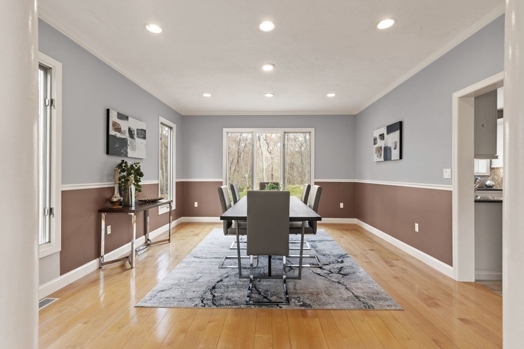 7 Wadsworth Way Sharon, MA 02067 - Photo 7 of 42 a living room with furniture a large window and kitchen view