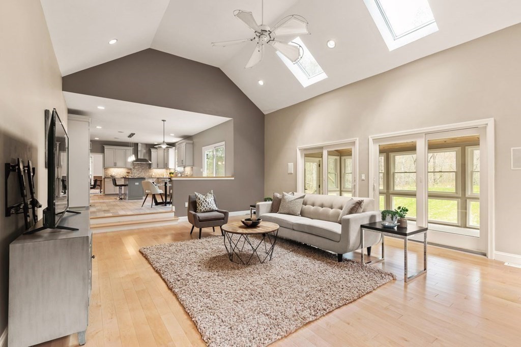 7 Wadsworth Way Sharon, MA 02067 - Photo 10 of 42 a living room with furniture and a large window