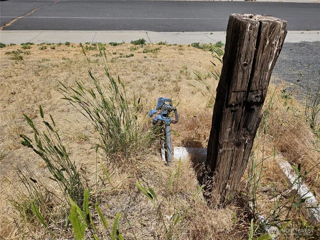 a view of a road with an ocean view