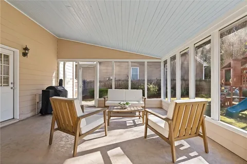 an aerial view of a house with outdoor space