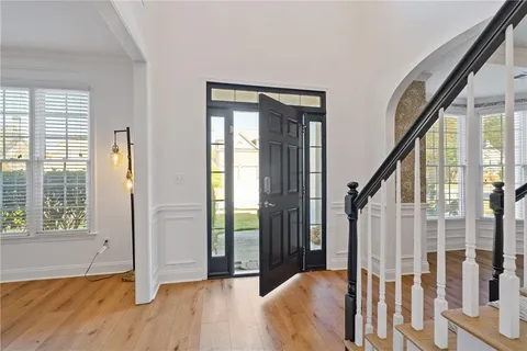 a living room with fireplace furniture and a flat screen tv
