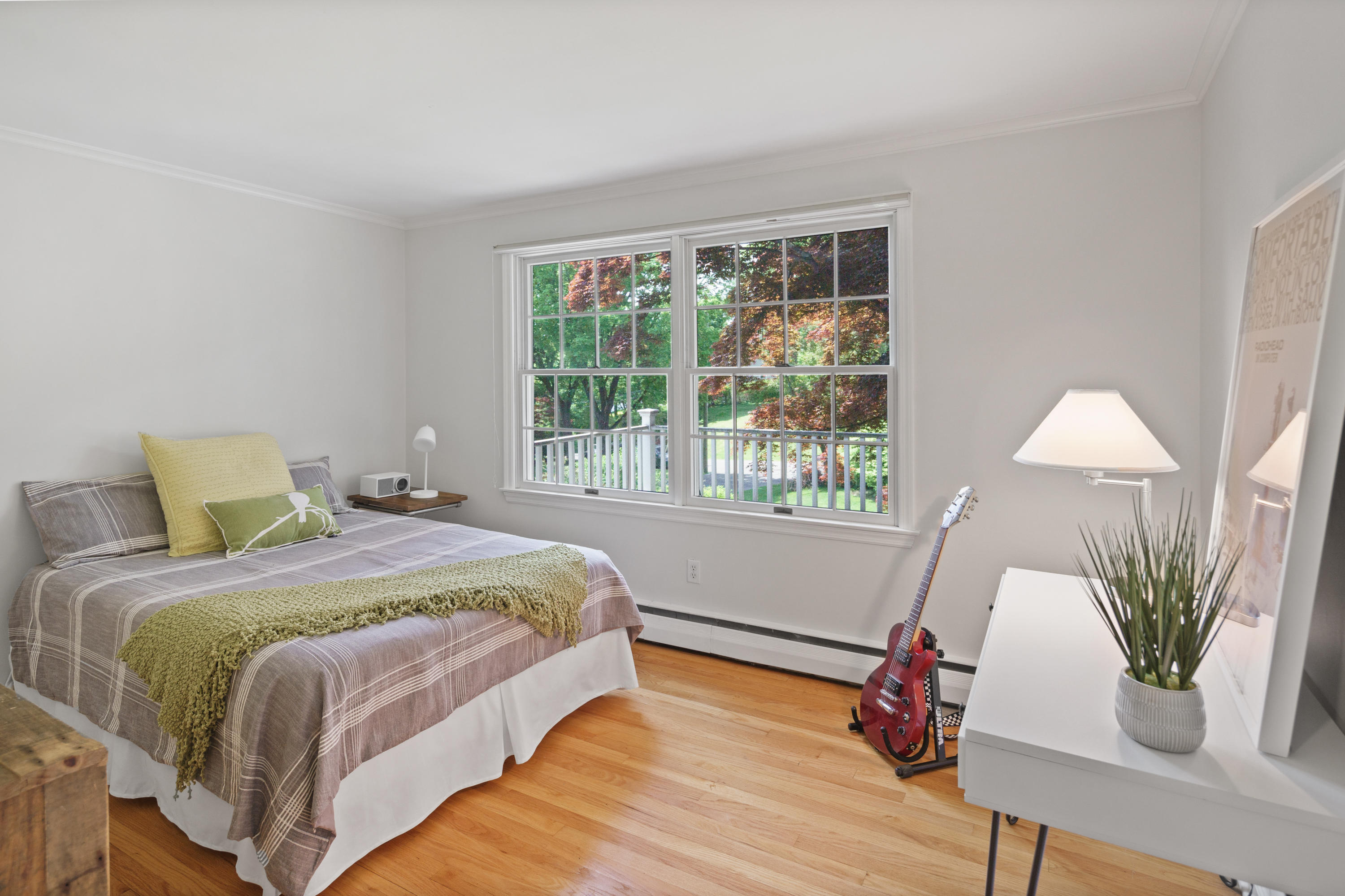 17 Wilson Ridge Road Darien, CT 06820 - Photo 28 of 37 a bed sitting in a bedroom next to a window