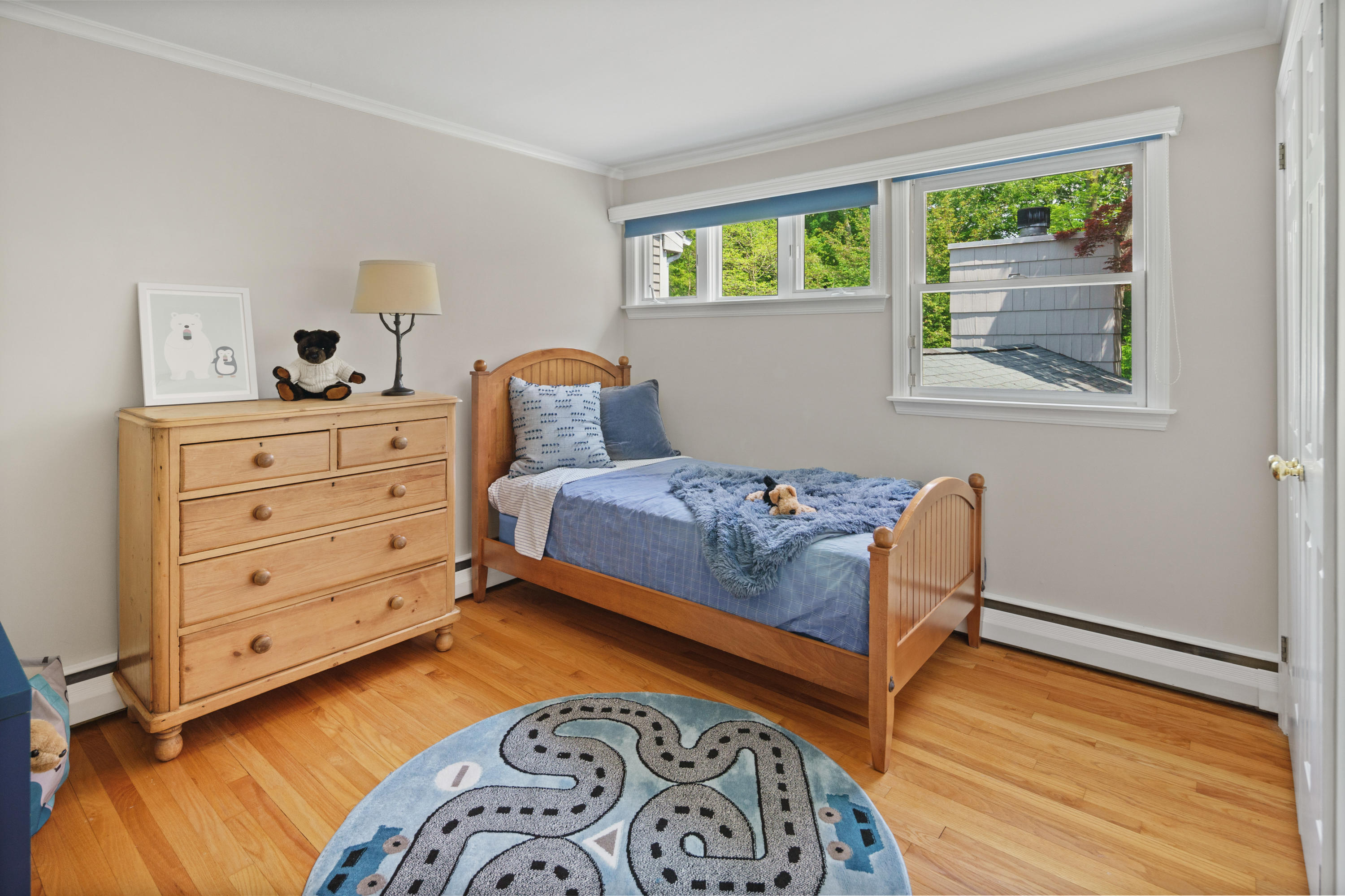17 Wilson Ridge Road Darien, CT 06820 - Photo 29 of 37 a bedroom with a bed and a window