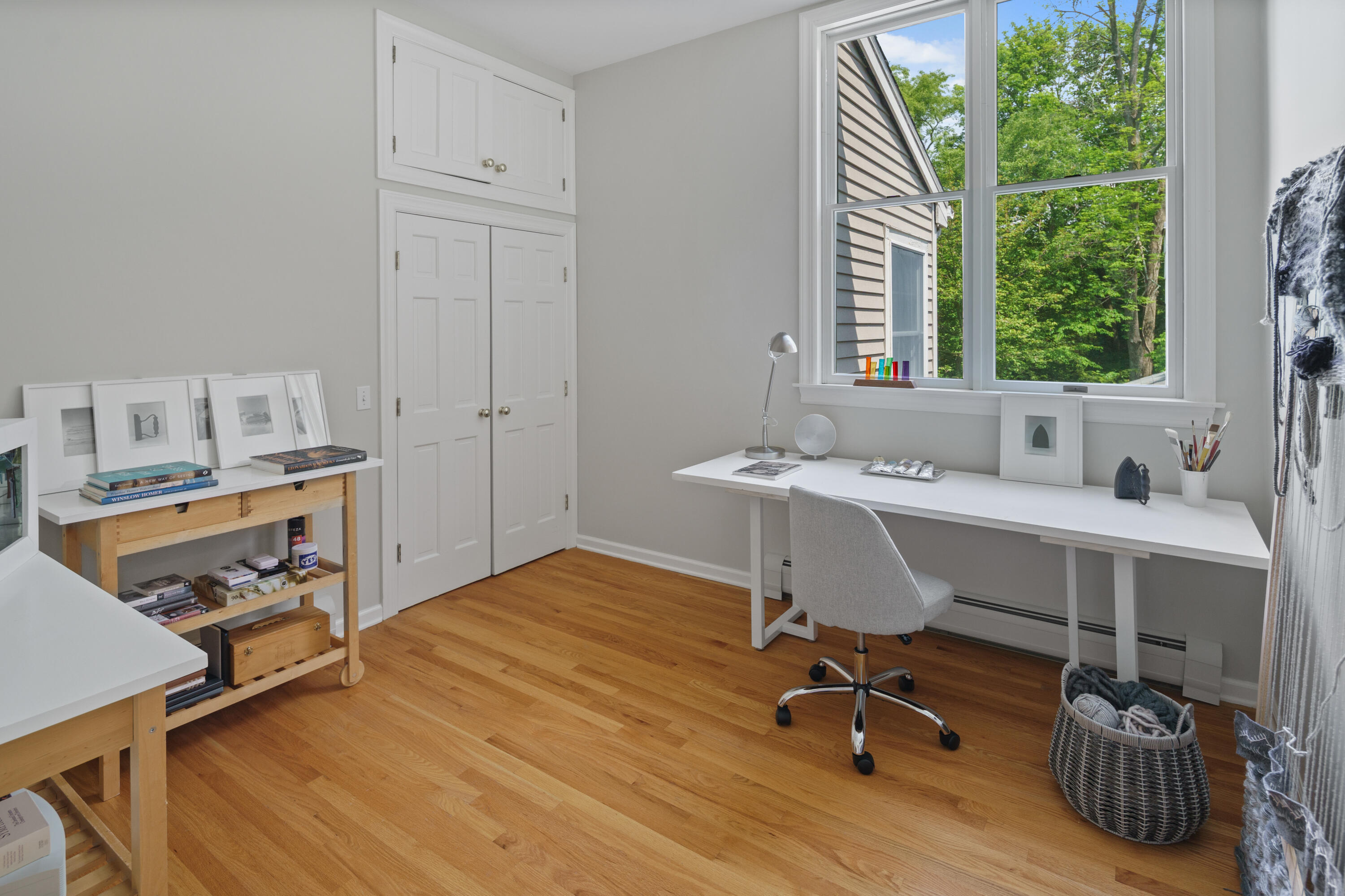 17 Wilson Ridge Road Darien, CT 06820 - Photo 31 of 37 a view of a workspace with furniture and a window