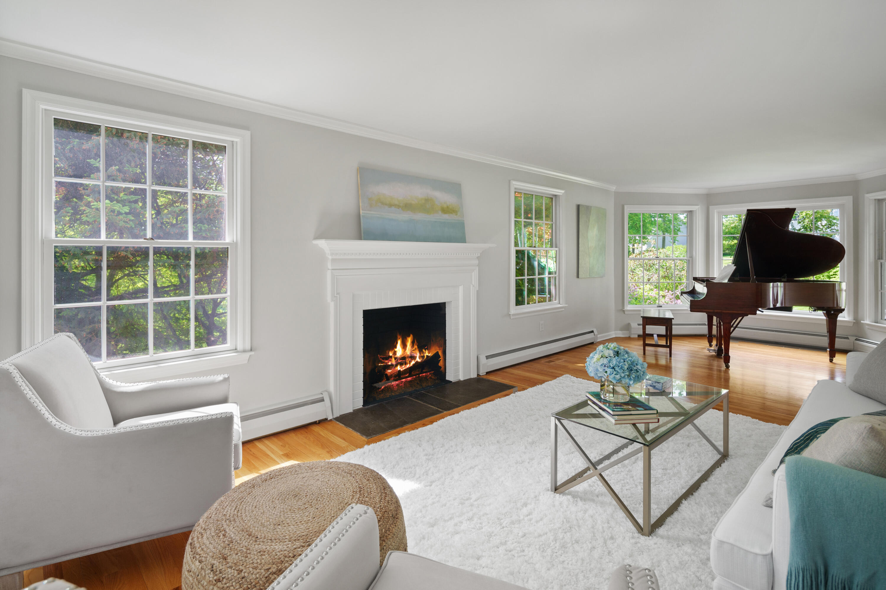 17 Wilson Ridge Road Darien, CT 06820 - Photo 6 of 37 a living room with furniture and a fireplace