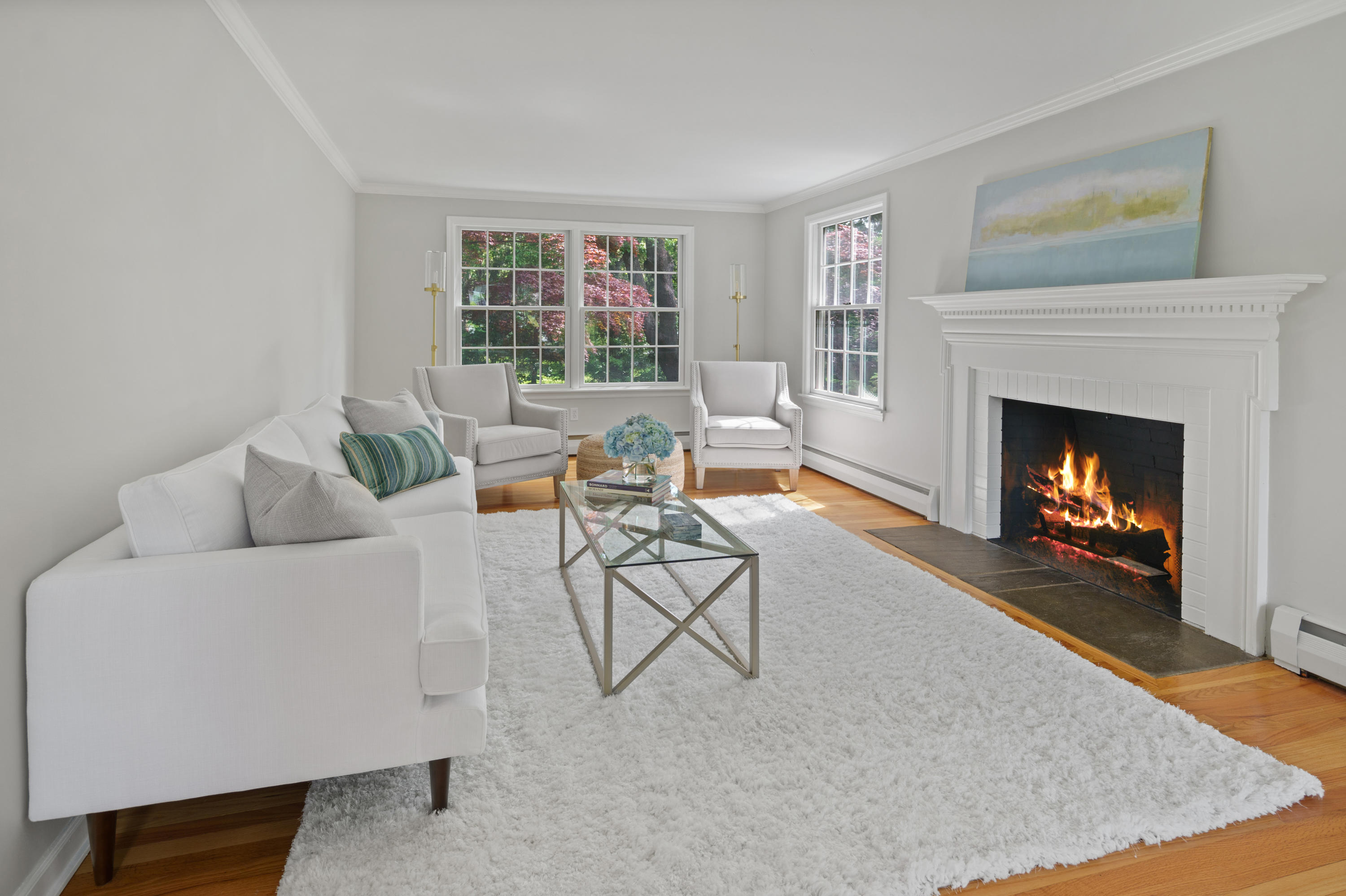 17 Wilson Ridge Road Darien, CT 06820 - Photo 7 of 37 a living room with furniture and a fireplace