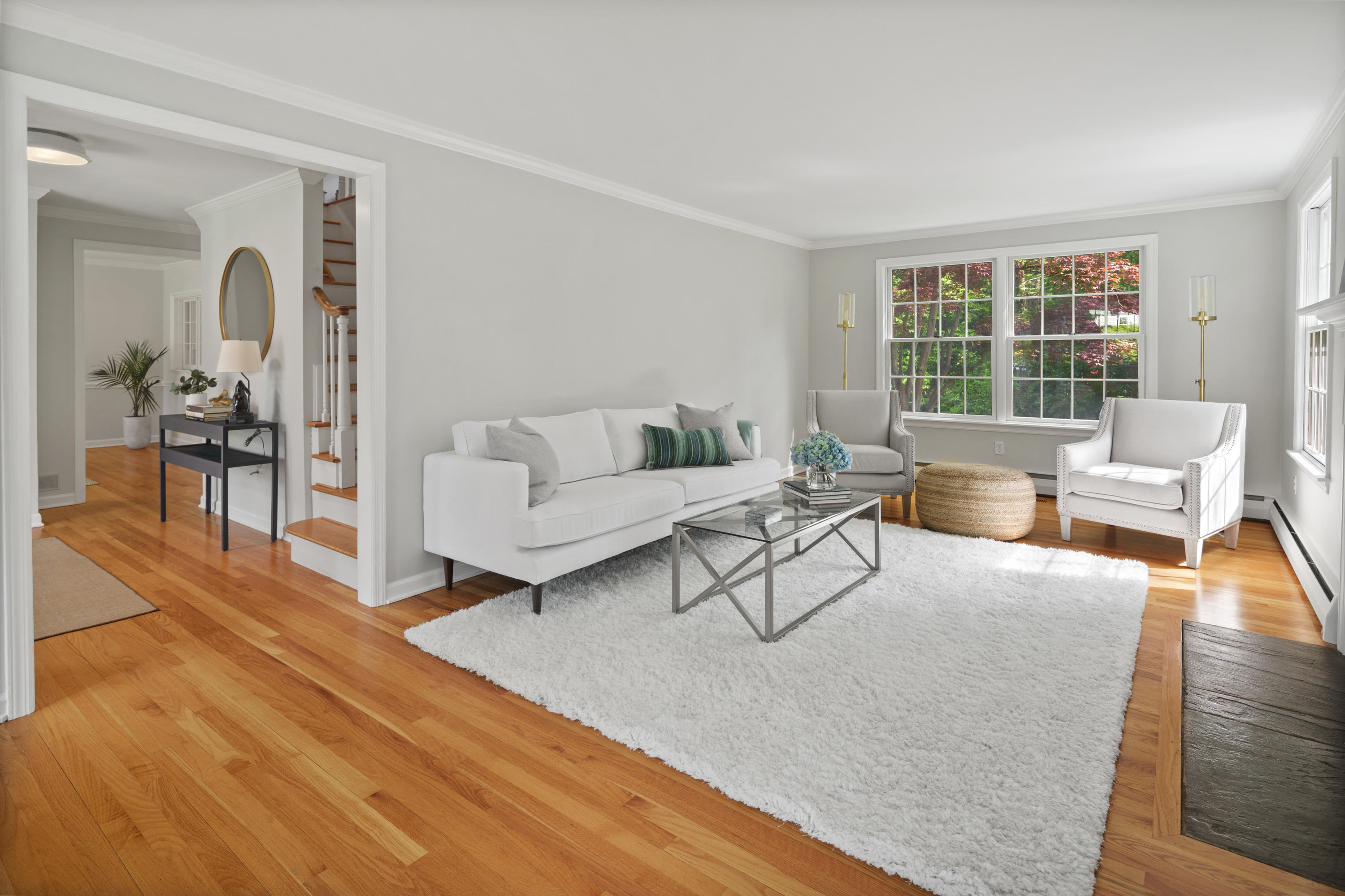 17 Wilson Ridge Road Darien, CT 06820 - Photo 8 of 37 a living room with furniture and a large window