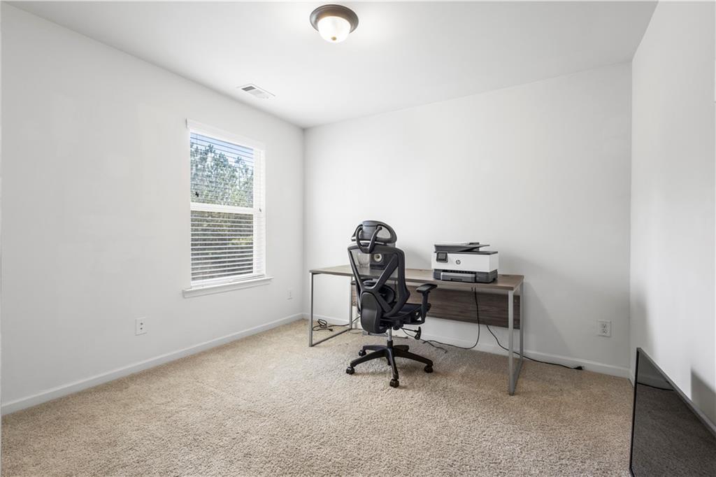 869 Venture Way Atlanta, GA 30331 - Photo 18 of 27 a view of a workspace with a window