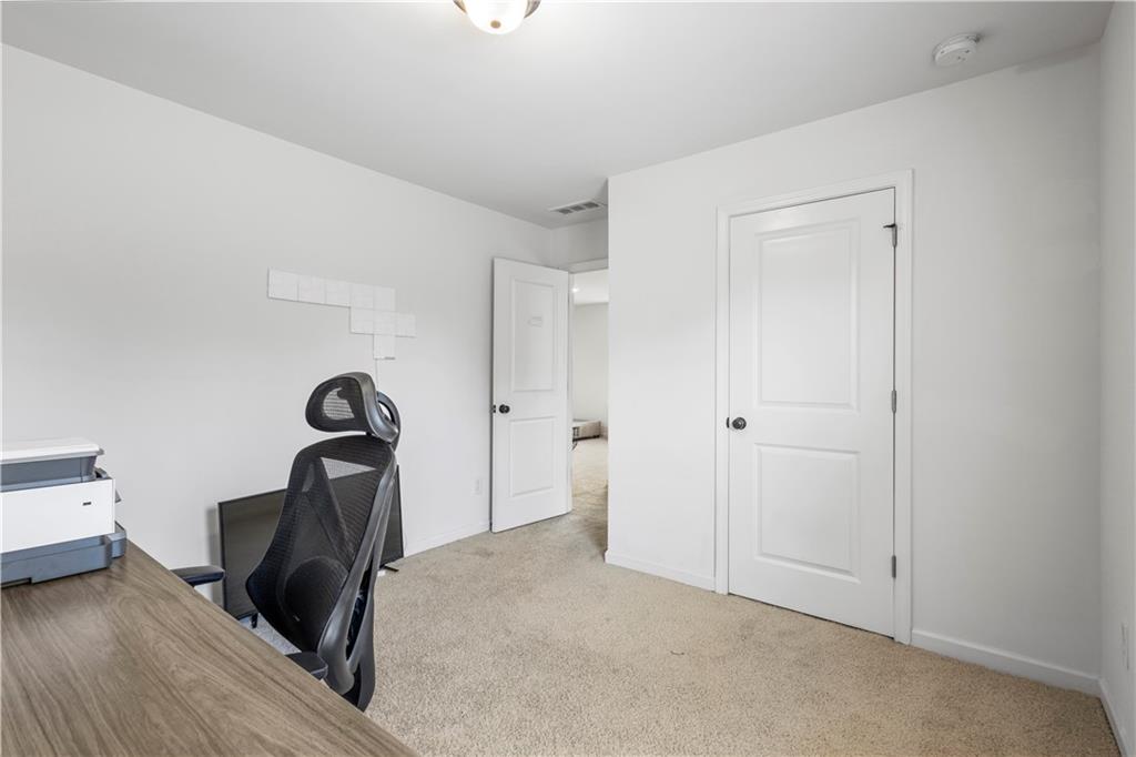 869 Venture Way Atlanta, GA 30331 - Photo 19 of 27 a view of a storage & utility room with closet window