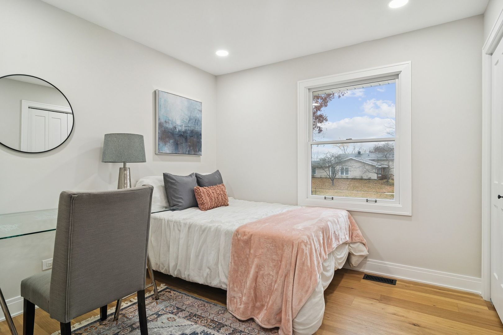 1420 Hassell Road Hoffman Estates, IL 60169 - Photo 17 of 26 a bedroom with a bed and a painting on the wall