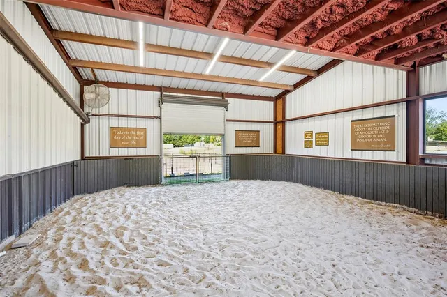 a view of entryway livingroom and hall with wooden floor