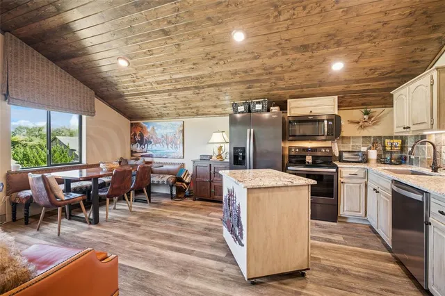 a view of a swimming pool with a yard