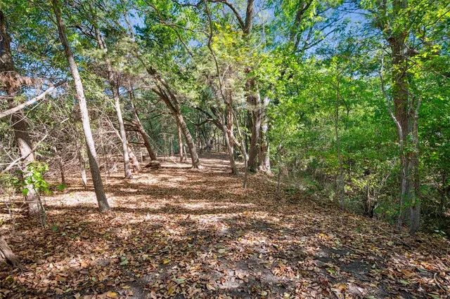 a view of a room with lots of stuff and furniture