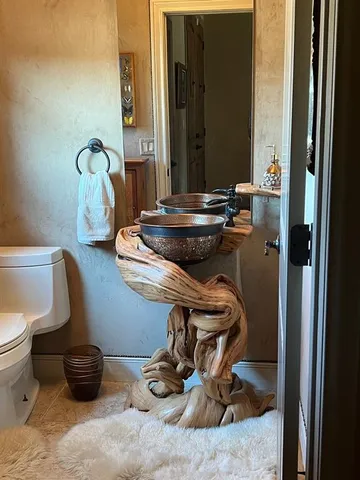 a room with table and chairs