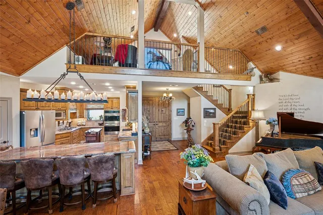 a front view of a house with outdoor seating