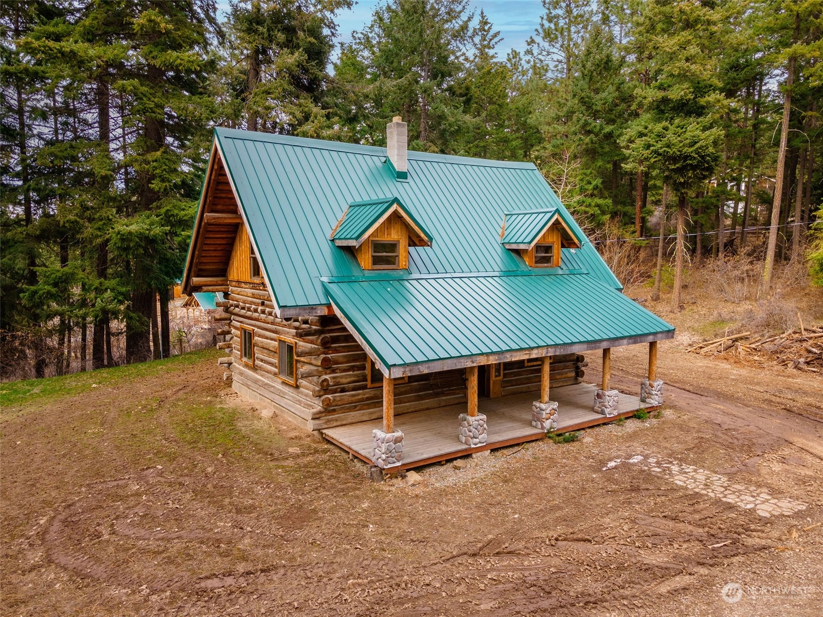 1230 Casassa Road Cle Elum, WA 98922 - Photo 17 of 40 aerial view of a house with swimming pool and sitting area