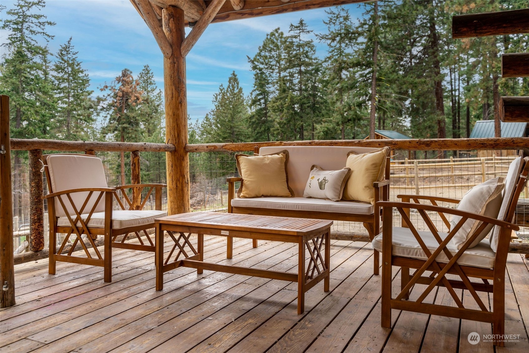 1230 Casassa Road Cle Elum, WA 98922 - Photo 2 of 40 a roof deck with chairs and wooden fence