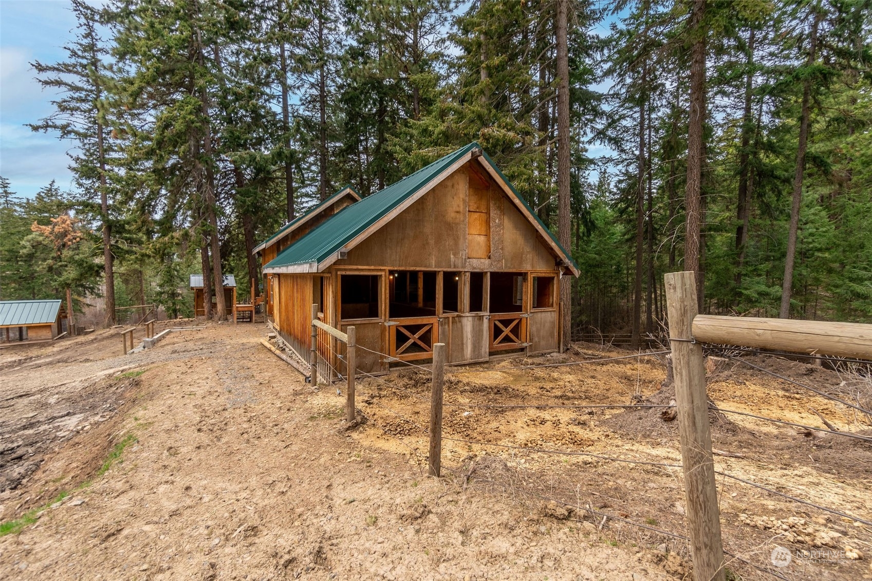 1230 Casassa Road Cle Elum, WA 98922 - Photo 30 of 40 a house with trees in the background