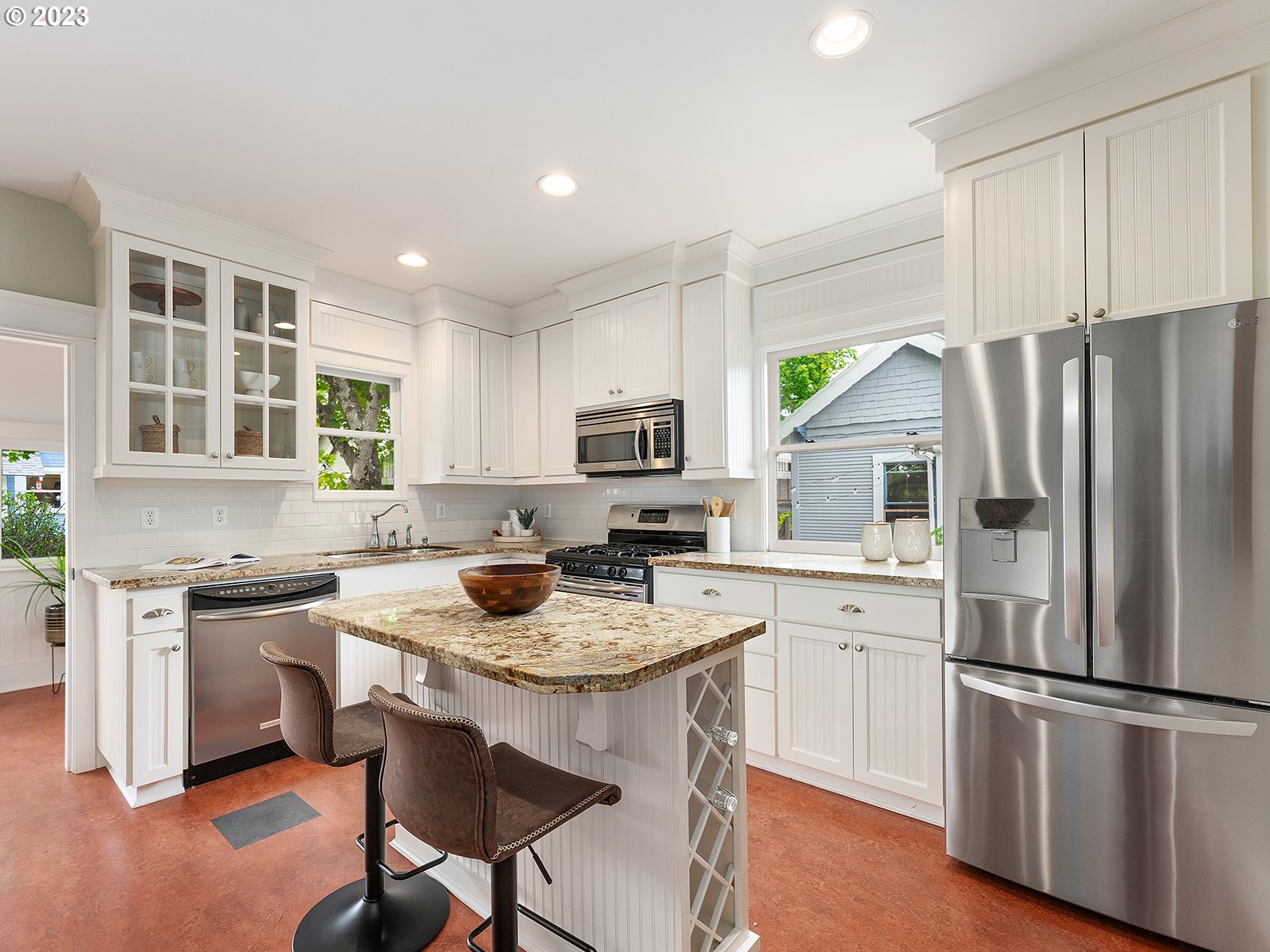 1920 Southeast 47th Avenue Portland, OR 97215 - Photo 12 of 40 a kitchen with a refrigerator stove top oven and sink