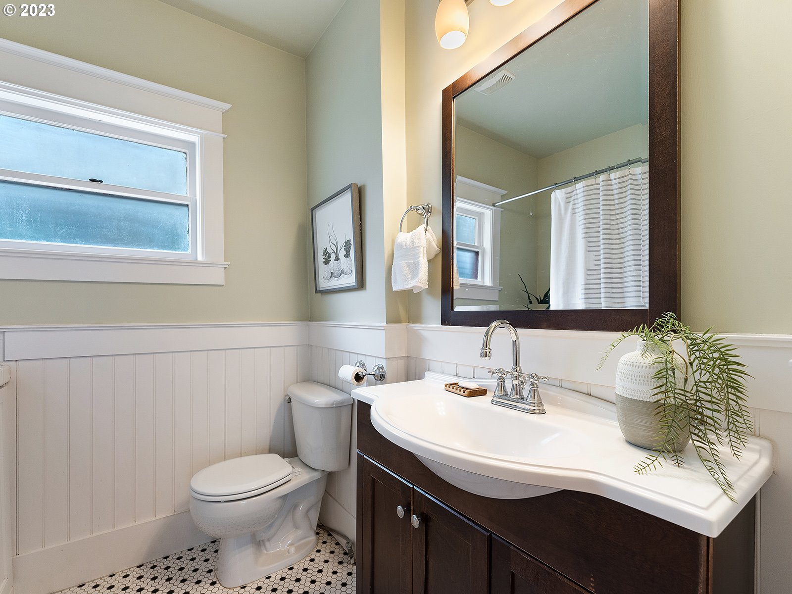 1920 Southeast 47th Avenue Portland, OR 97215 - Photo 20 of 40 a bathroom with a sink and a mirror