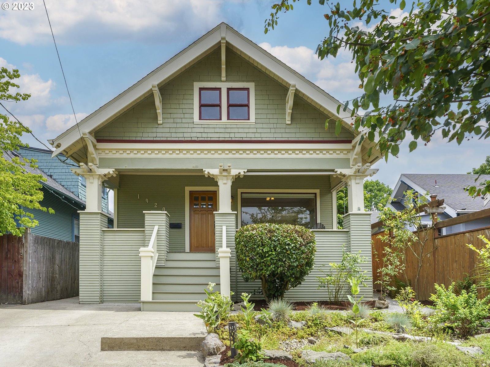 1920 Southeast 47th Avenue Portland, OR 97215 - Photo 2 of 40 a front view of a house with a yard