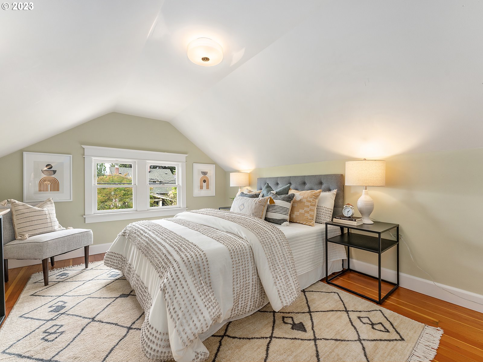 1920 Southeast 47th Avenue Portland, OR 97215 - Photo 24 of 40 a bedroom with a bed and a window