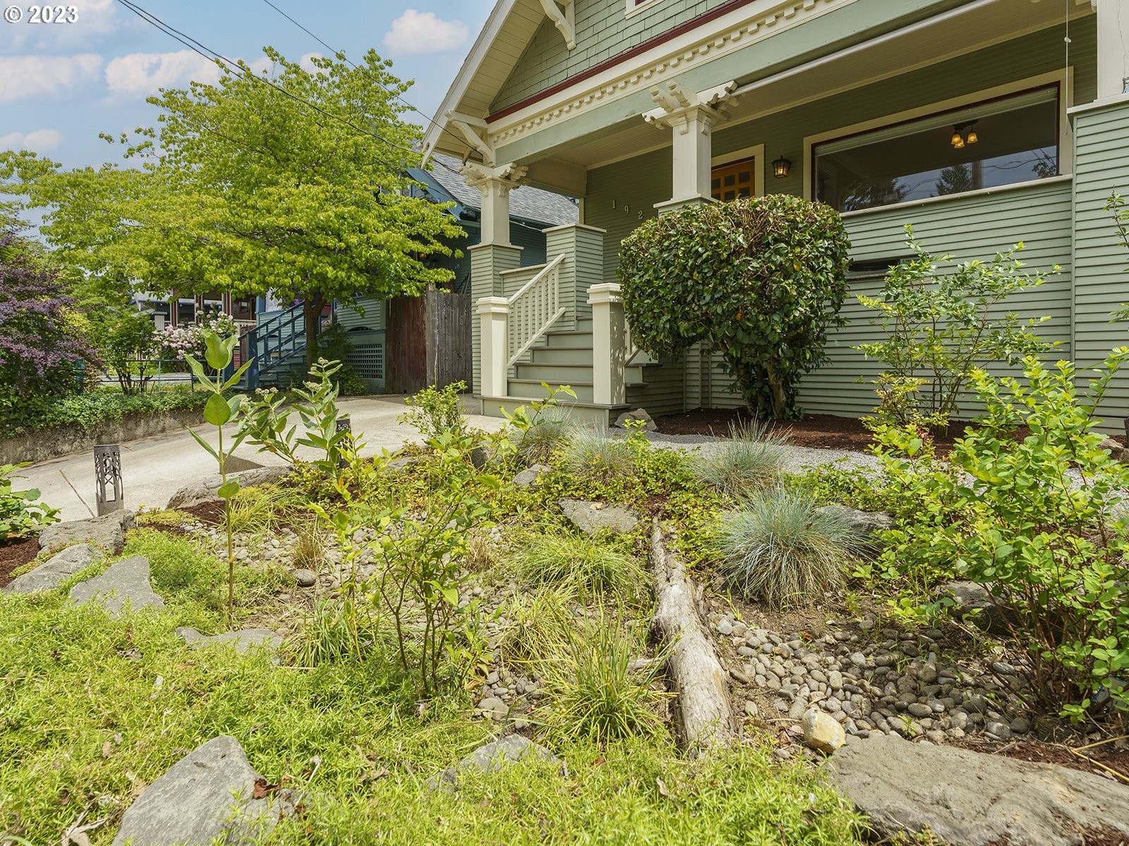 1920 Southeast 47th Avenue Portland, OR 97215 - Photo 31 of 40 a view of a house with a garden