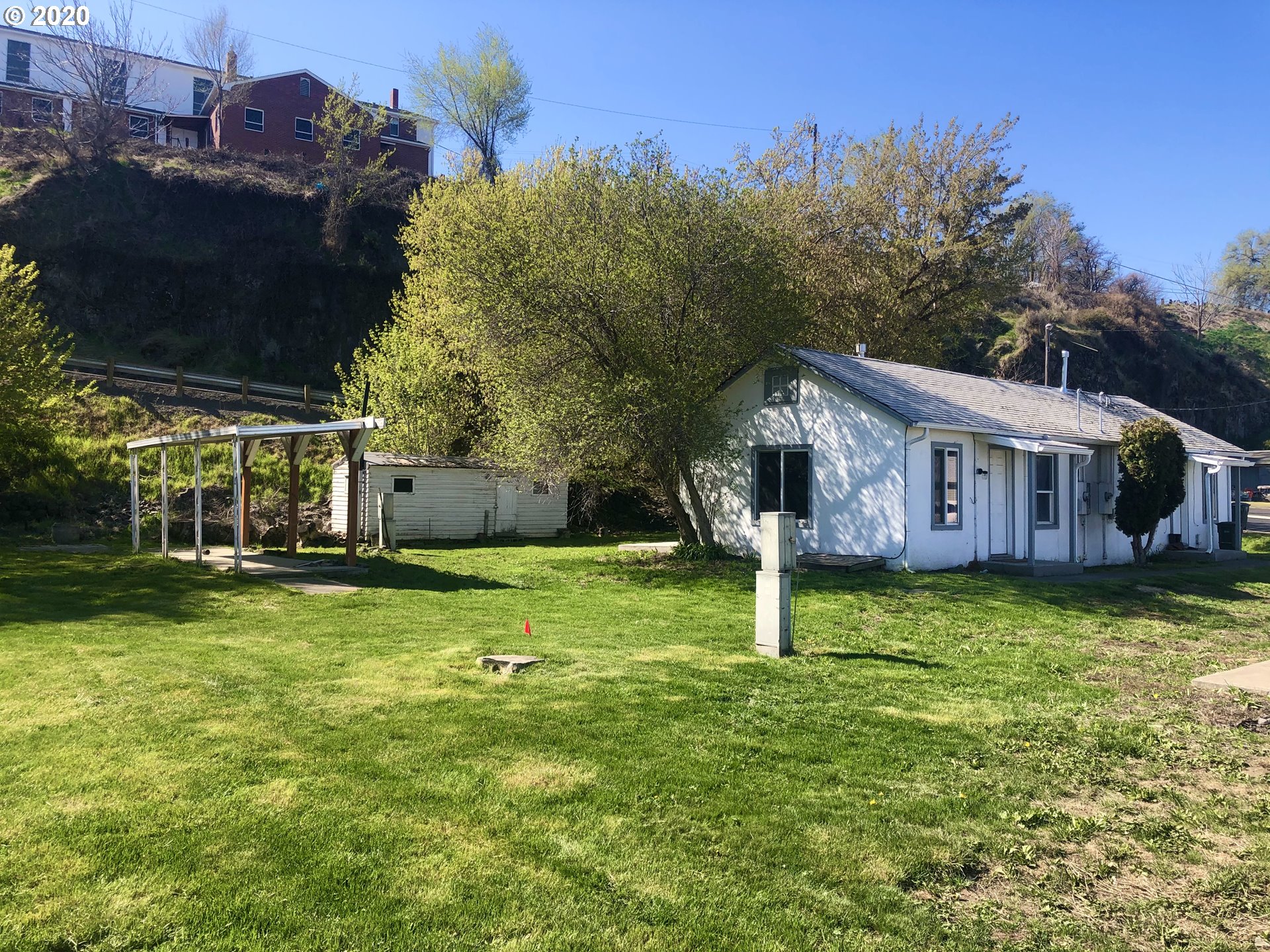 519 Southwest 14th Street Pendleton, OR 97801 - Photo 1 of 11 a view of a house with a yard