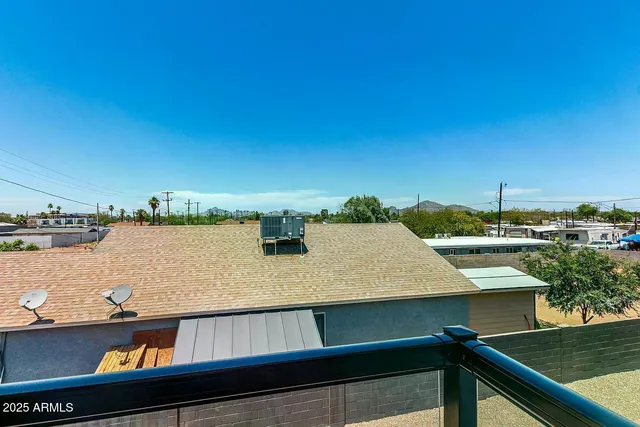 a view of a lake from a balcony