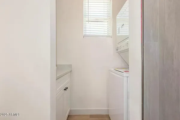 a bathroom with a toilet and a sink
