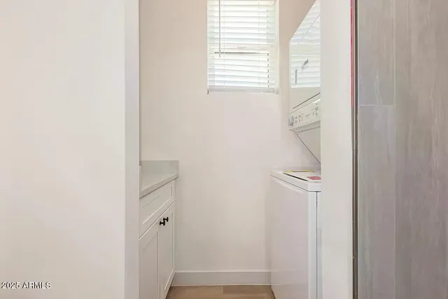 a bathroom with a toilet and a sink