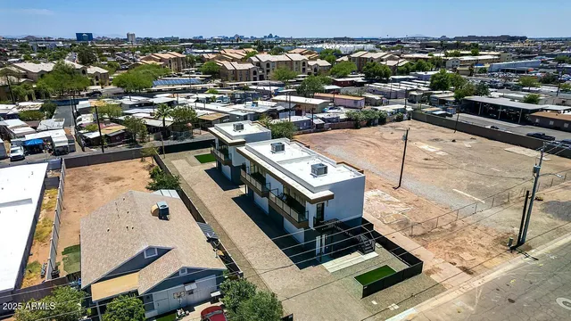 a bedroom with a bed and a chair