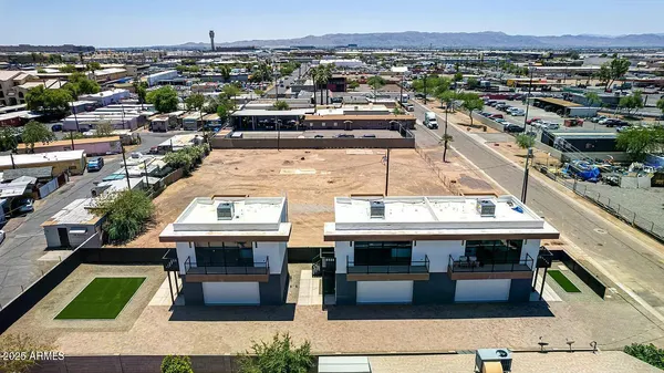 a kitchen with stainless steel appliances white cabinets and a stove