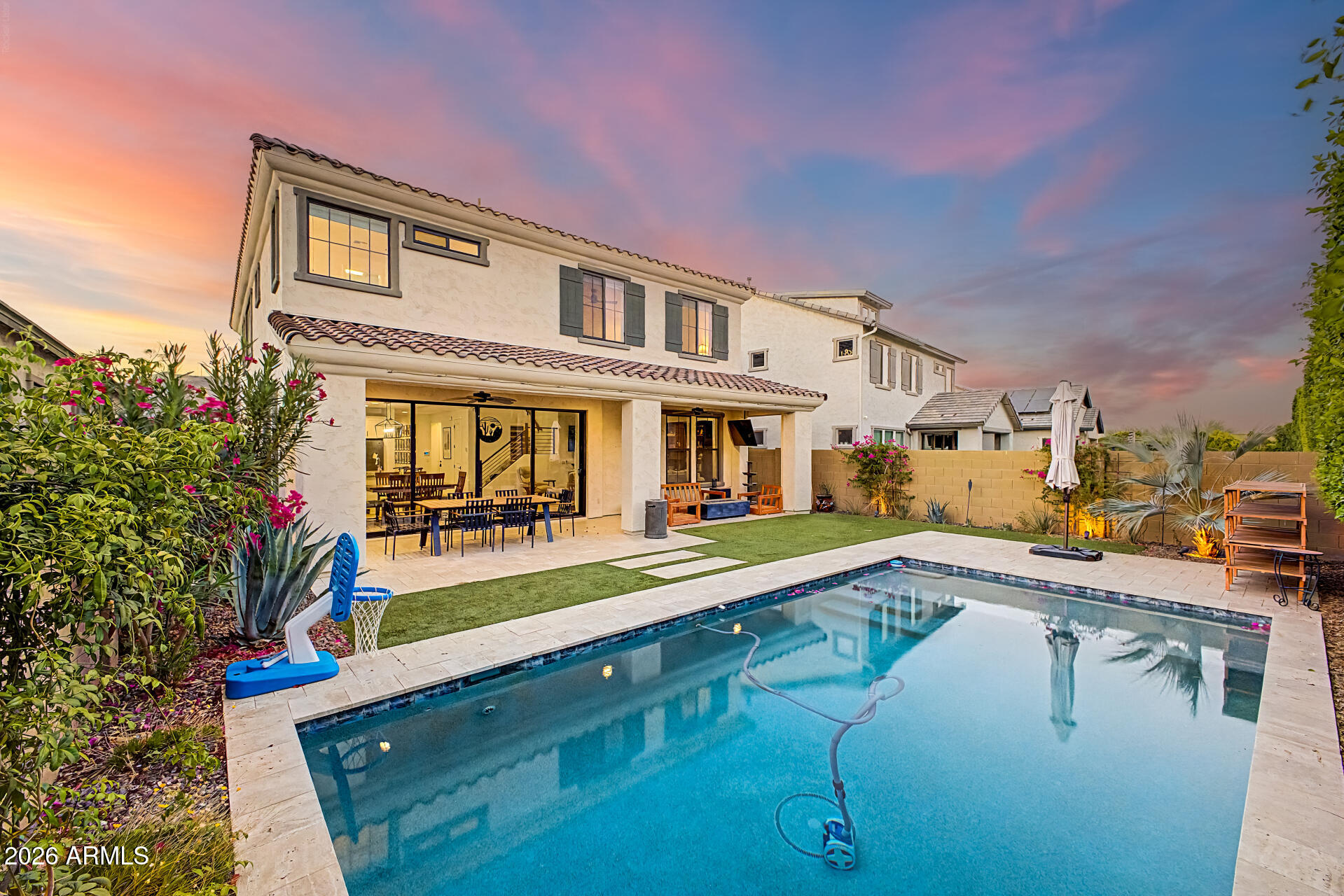 819 West Deer Creek Road Phoenix, AZ 85048 - Photo 67 of 76 a view of a house with swimming pool and sitting area