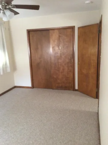 a bathroom with a sink a vanity and a bathtub