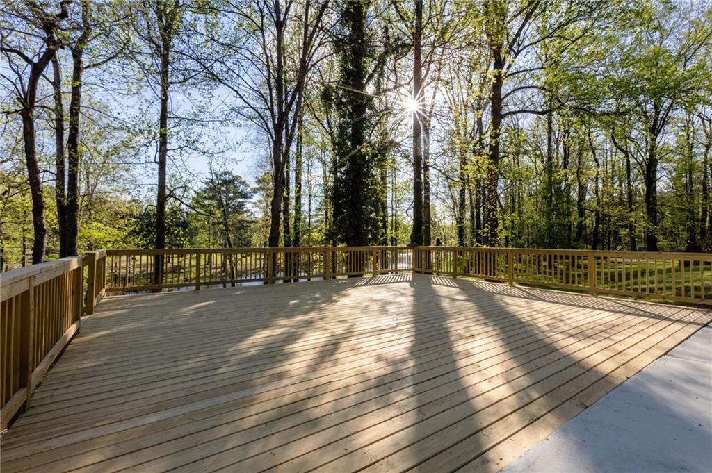 143 Swanson Road Fayetteville, GA 30214 - Photo 5 of 27 a view of a yard with wooden floor