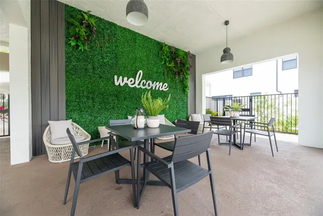 a view of a livingroom with furniture and window
