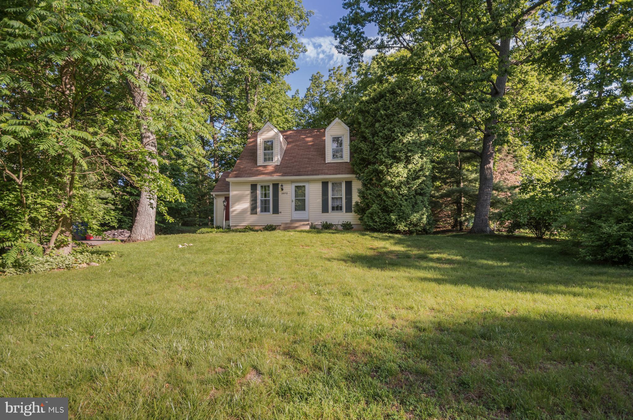 3812 Pippins Place Point of Rocks, MD 21777 - Photo 2 of 19 a front view of a house with a garden