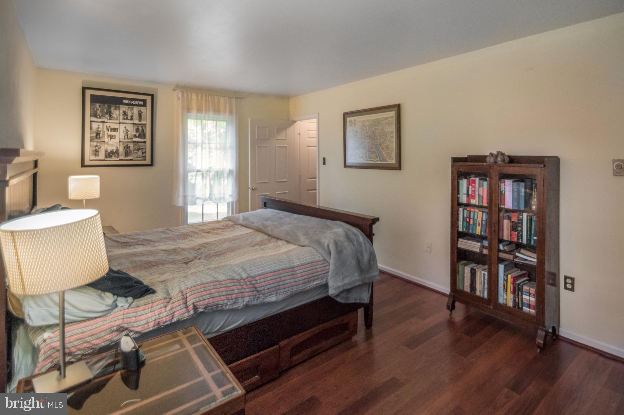 3812 Pippins Place Point of Rocks, MD 21777 - Photo 9 of 19 a bedroom with a bed and a bookshelf