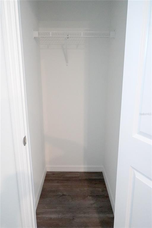 2476 Riversong Ldg Lane Wesley Chapel, FL 33543 - Photo 12 of 22 a view of a small space with wooden floor
