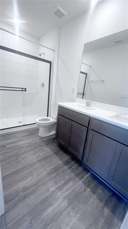 2476 Riversong Ldg Lane Wesley Chapel, FL 33543 - Photo 17 of 22 a bathroom with a sink and mirror