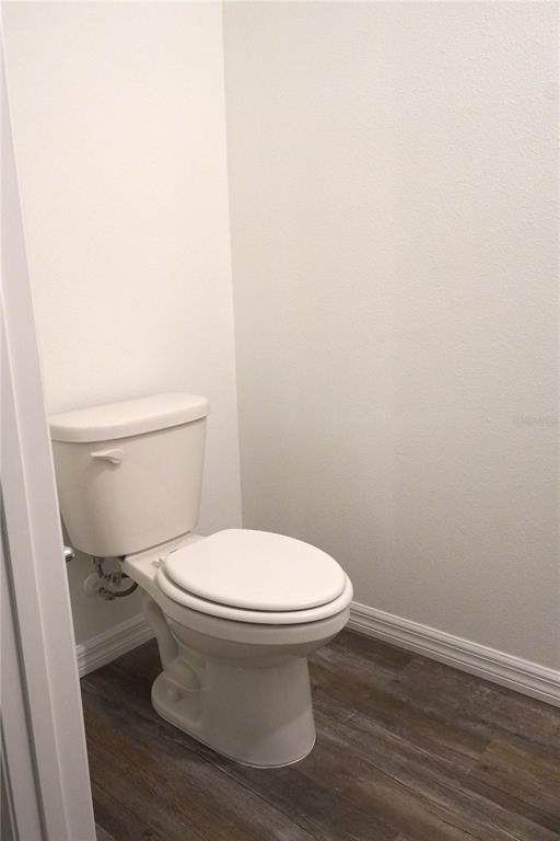 2476 Riversong Ldg Lane Wesley Chapel, FL 33543 - Photo 5 of 22 a white toilet sitting next to a white sink