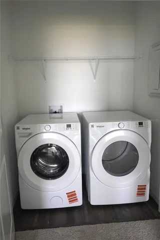 a utility room with dryer and washer