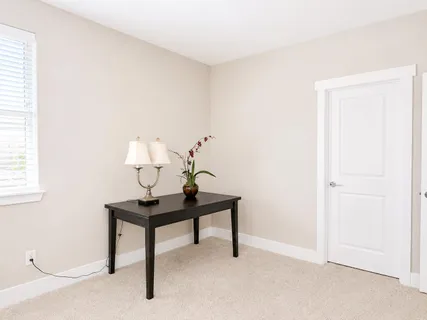 a view of a room with a bench in it