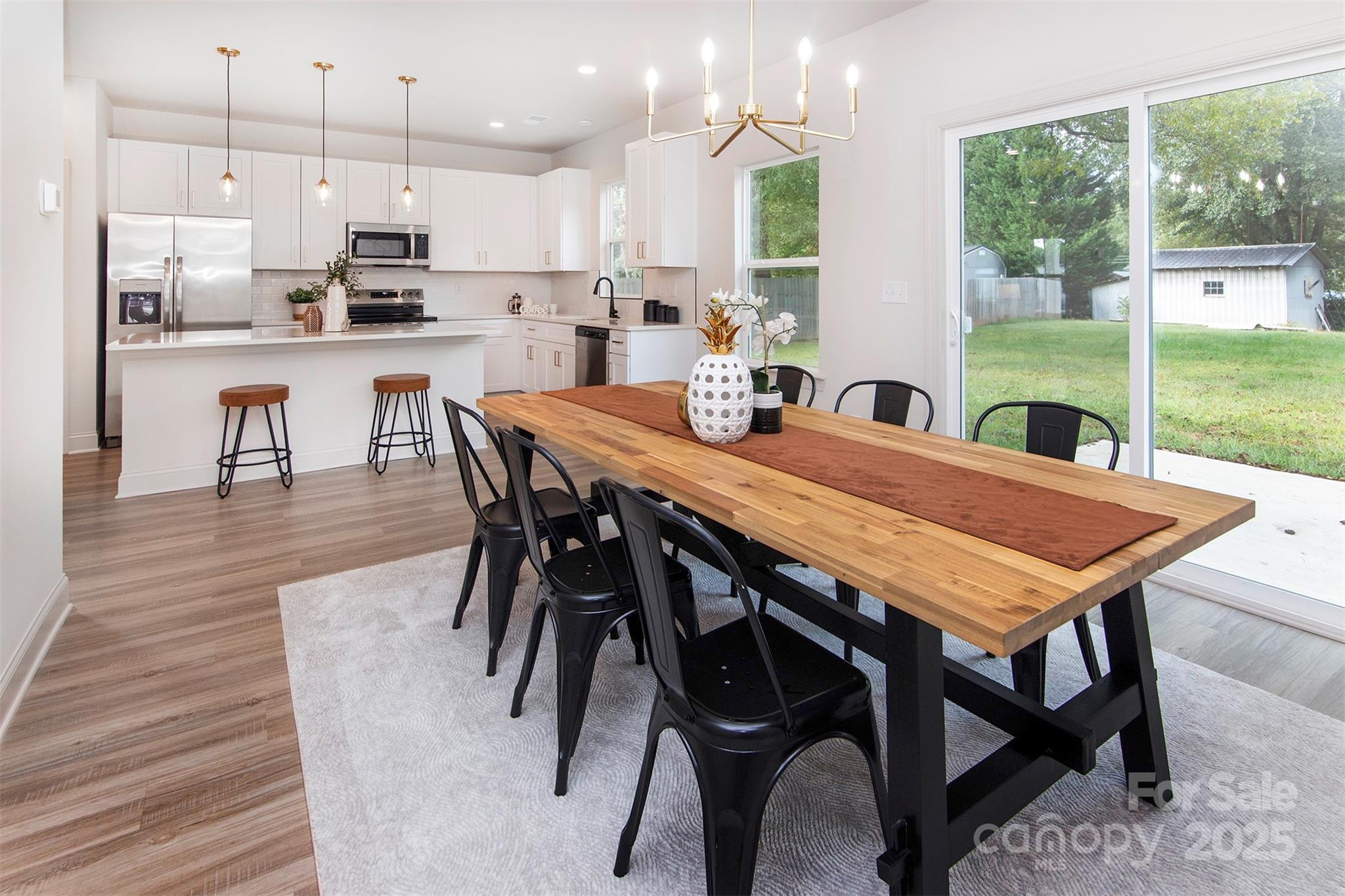 118 Durham Road Stanley, NC 28164 - Photo 12 of 24 a view of a dining room with furniture window and wooden floor