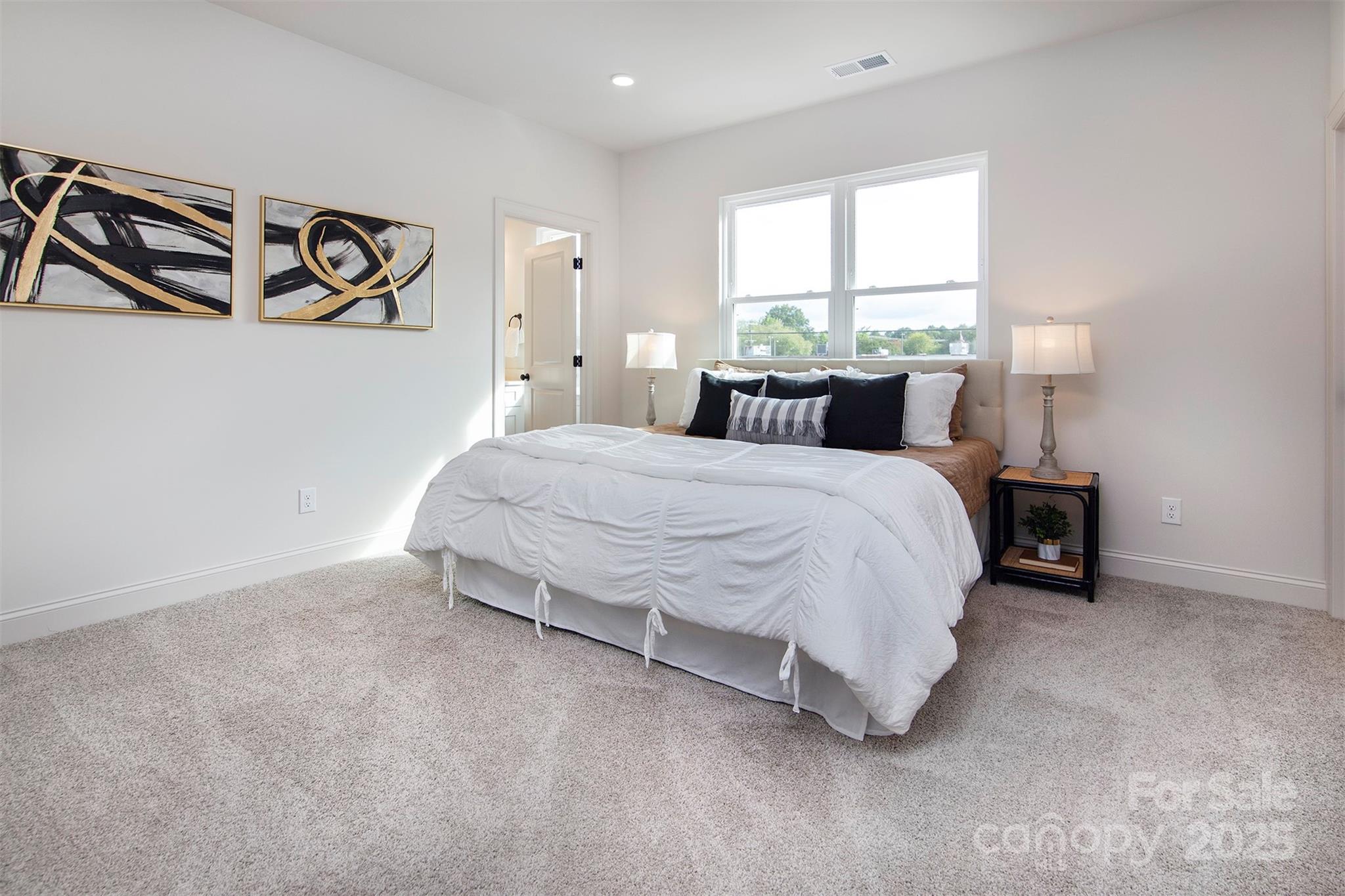 118 Durham Road Stanley, NC 28164 - Photo 16 of 24 a bedroom with a bed and window