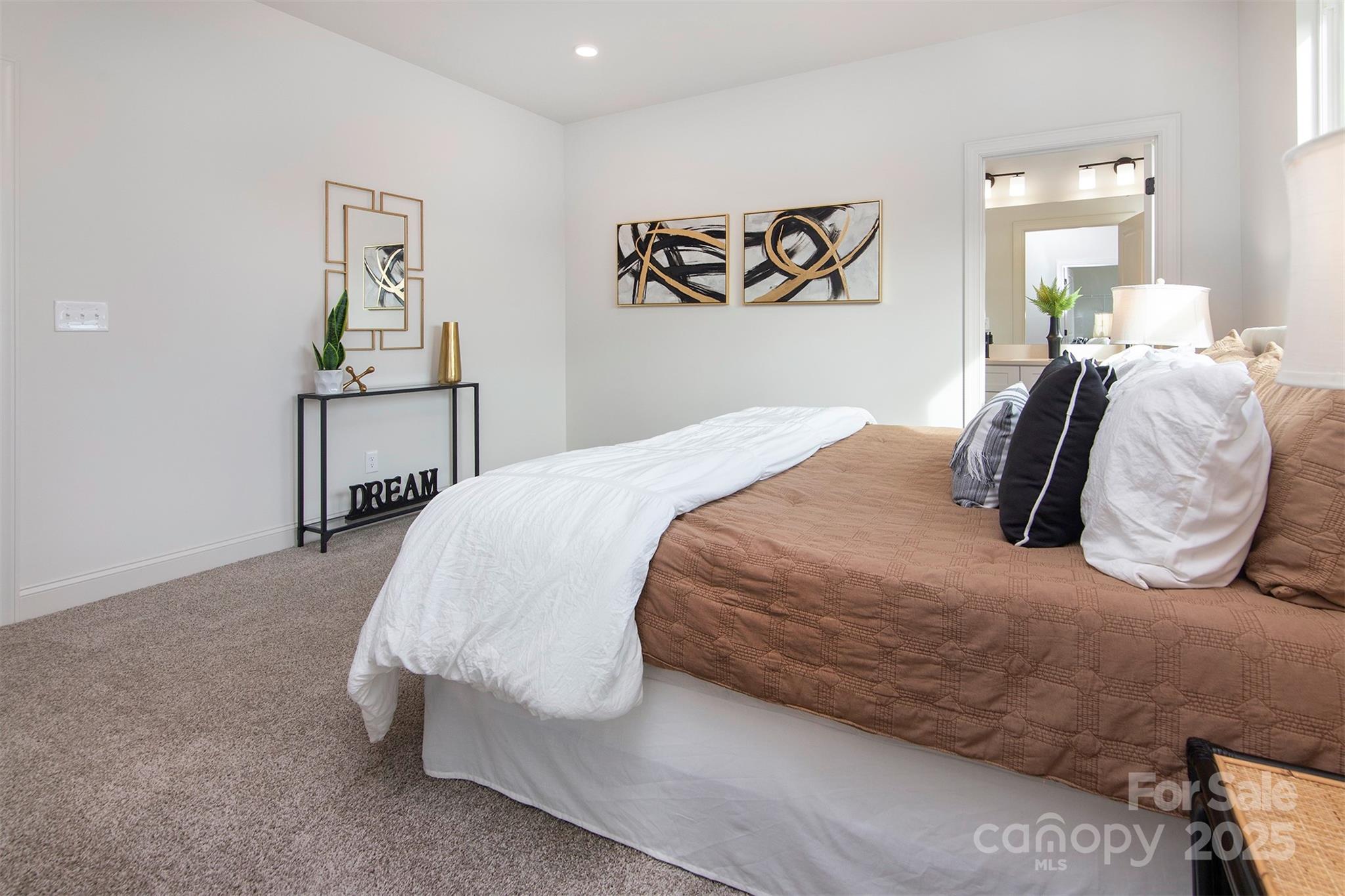 118 Durham Road Stanley, NC 28164 - Photo 18 of 24 a bedroom with a bed and painting on the wall